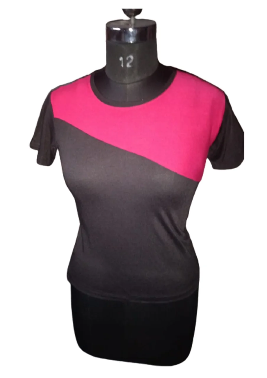Black and pink colorblock short-sleeve top on a dress mannequin, plain background